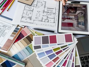 blueprints and color schemes on a table